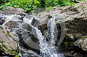 Small waterfall mountain stream