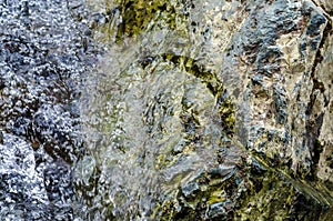 Small waterfall mountain stream close up