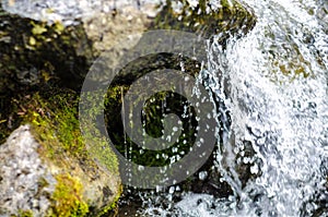 Small waterfall mountain stream close up