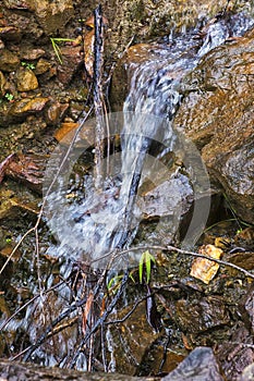 Small waterfall over rocks