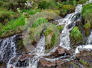 Small waterfall on the side of the road