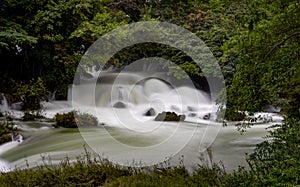 Small waterfall, stream, water flow in the jungle