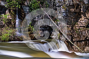 Small waterfall by Valley Falls on a bright spring morning