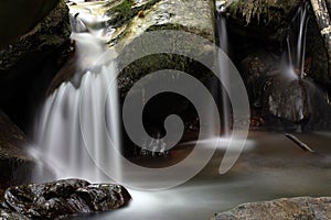 Small waterfalls in watery landscape