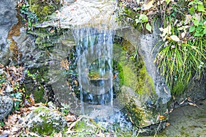 A small waterwall with clear water