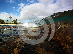 A Small Wave Breaking on Shallow Reef