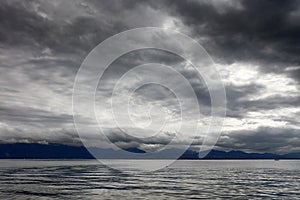 Small waves and clouds on Lake Leman, Switzerland, Europe