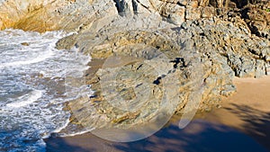 Small waves and rocky coast