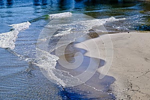 Small Waves Washing on White Sand Beach