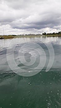 Small wavy artifial lake on holiday