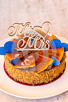 Small wedding cake with caramel and biscuit