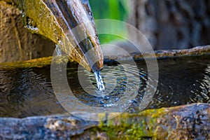 Small wellspring flow into a pipe