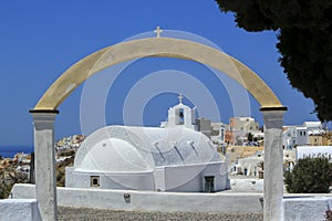 Small white church in Oia, Santorini island, Greece