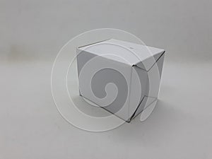 A small white foldable paper boxes in white isolation background