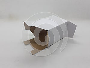 A small white foldable paper boxes in white isolation background