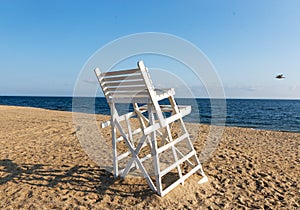 Small white lifeguard stand at the Long Island Sound