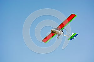 Small white plane in the sky