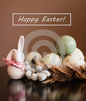 Small white rabbit figurine with easter eggs