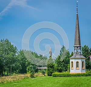 Small white religious chapel church building up the hill