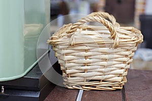 Small wicker basket on a a breakfast bar