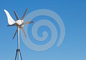 Small wind powered electric generator