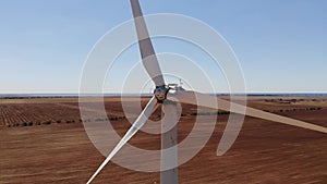 Small wind turbines with blades in the field aerial view. An old type of wind generator. alternative energy