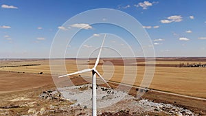 Small wind turbines with blades in the field aerial view. An old type of wind generator. alternative energy