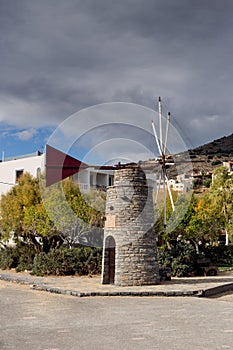 A small windmill on a sunny day