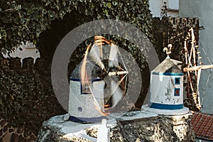 Small windmills in an amusement park in Aldeia Jose Franco, Mafra, Portugal photo