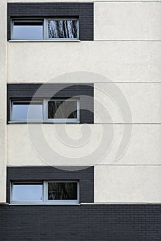 Small windows in multi family house exterior