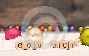 Small wooden blocks with the inscription God Jul, Scandinavian Merry Christmas