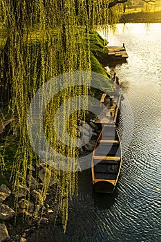 Small wooden boat floating on water