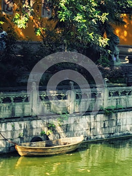 Small wooden boat at Leifeng Pagoda