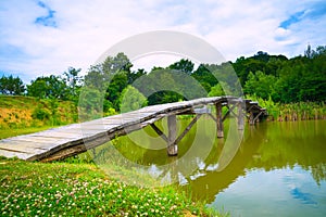 A small wooden bridge across a river