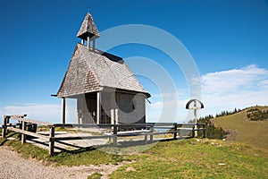 Small wooden chapel at Kampenwand mountain, wayside cross, meditational place upper bavaria photo