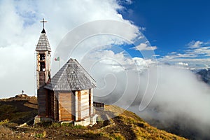 Small wooden church or chapel on the mountain