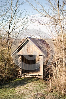 Small Wooden Covered Bridge in Wintertime