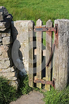 Small wooden gate, spring to close automatically photo