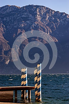 Small wooden jetty - Lake Garda and Baldo mountain Italy