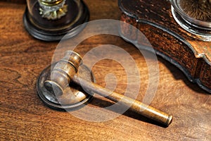 Small wooden judges gavel on a desk in a high angle view