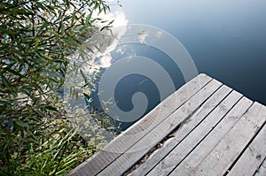 Small wooden pier near the river