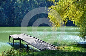 Small wooden pier near the river