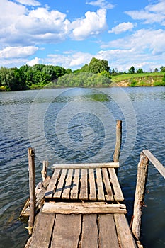 Small wooden pier near the river