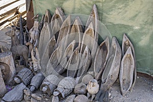 small wooden pirogues and various objects at craft market, Okahandja, Namibia photo