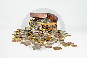 A small wooden treasure chest which is bursting with coins