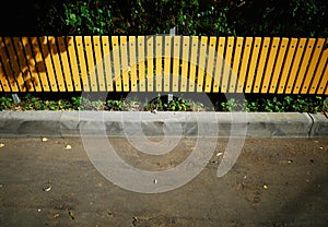 Small wooden yellow fence background
