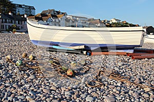 Small Working Boat On The Beach At Budleigh Salterton, Devon, UK