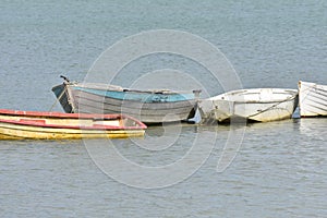 Small worn out dinghy boats