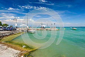 Small yachts in harbor in Desenzano, Garda lake, Italy