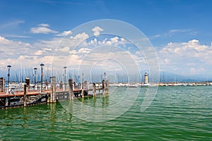 Small yachts in harbor in Desenzano, Garda lake, Italy